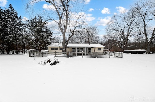 view of yard layered in snow