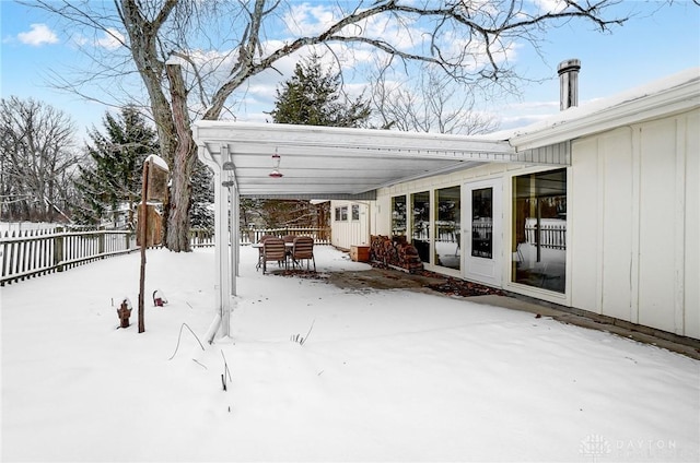 view of snow covered patio