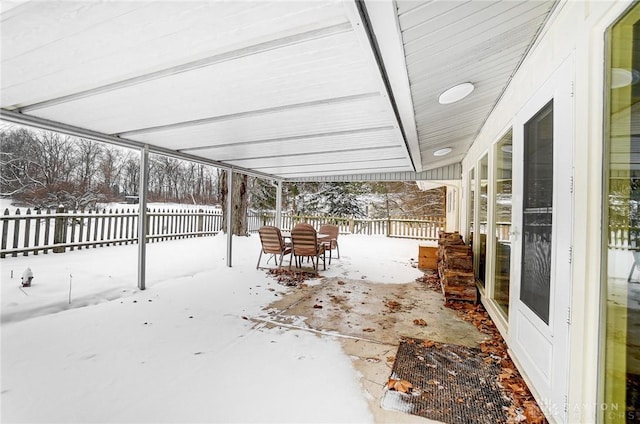 view of snow covered patio