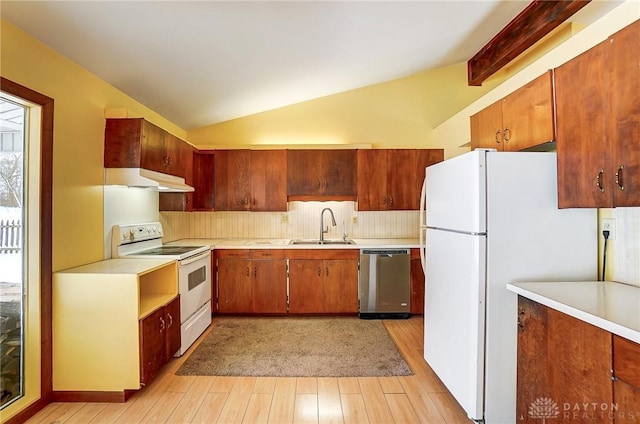 kitchen with vaulted ceiling with beams, light wood-type flooring, white appliances, and sink