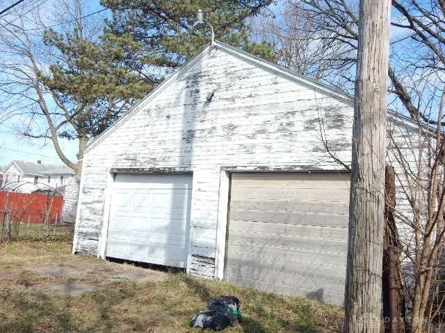 garage with fence