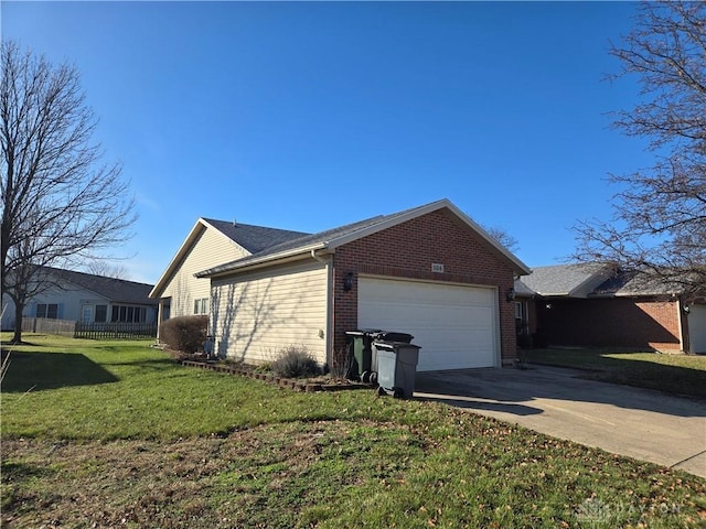 view of side of home with a yard