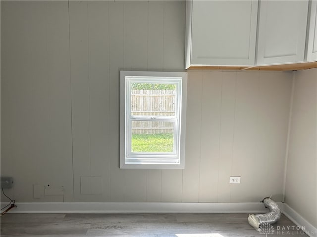 spare room featuring hardwood / wood-style flooring