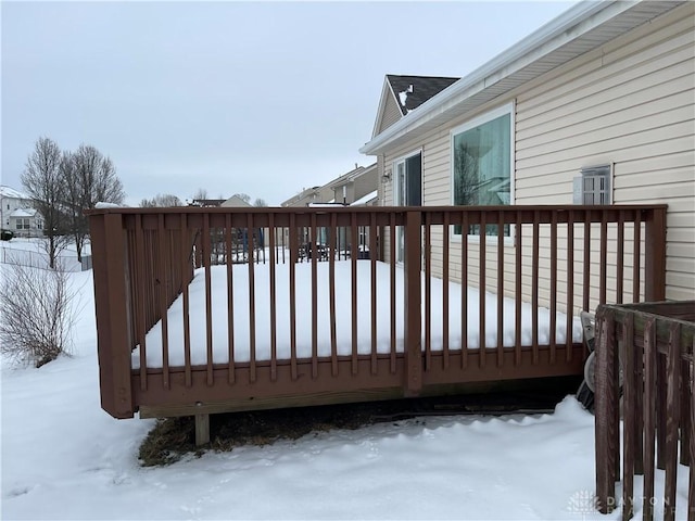 view of snow covered deck