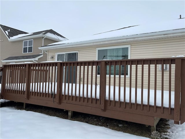 view of snow covered deck