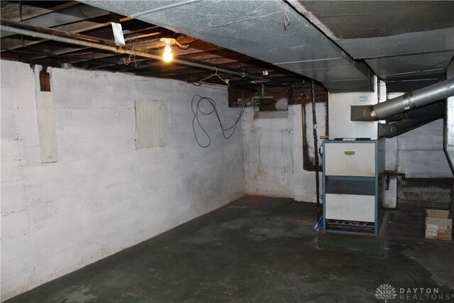 basement featuring heating unit