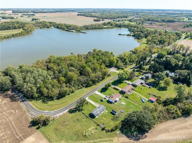 drone / aerial view featuring a water view and a rural view