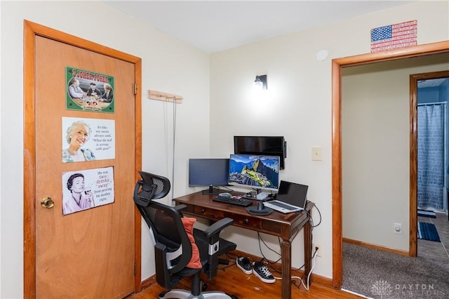 office space featuring baseboards