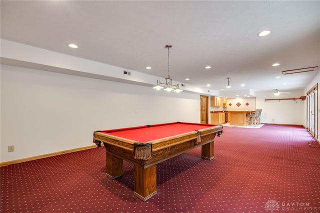 game room featuring billiards, dark carpet, and indoor bar