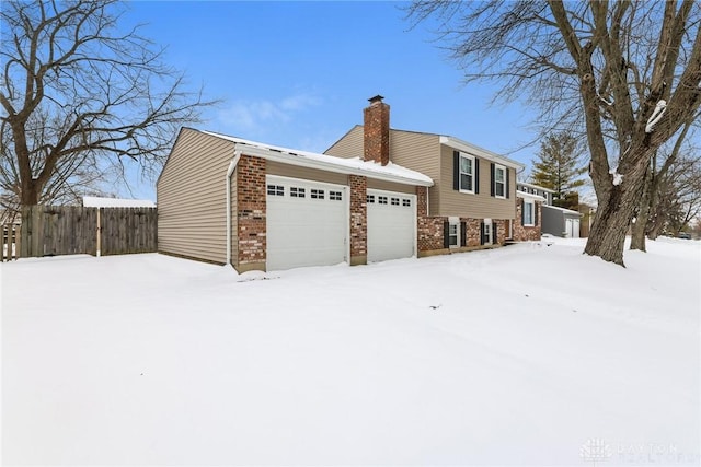 view of snow covered property