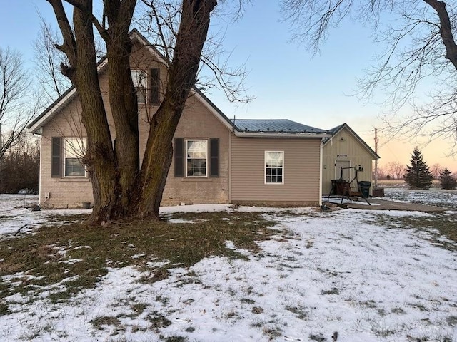 view of snow covered property