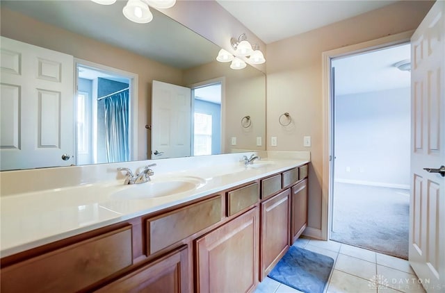 bathroom with vanity and tile patterned floors