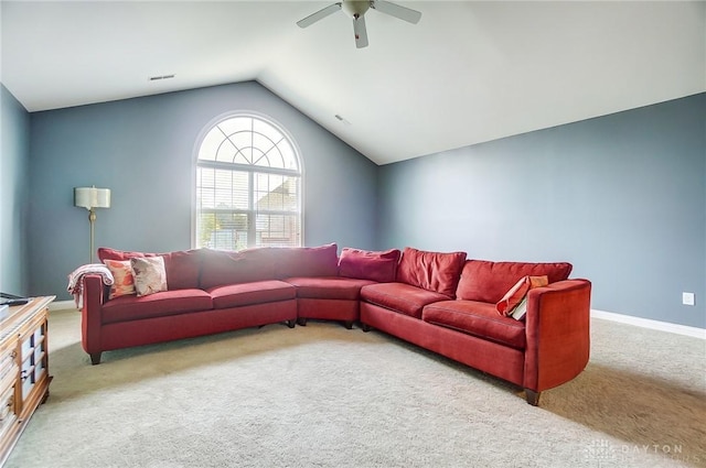 living room featuring ceiling fan, light colored carpet, and vaulted ceiling