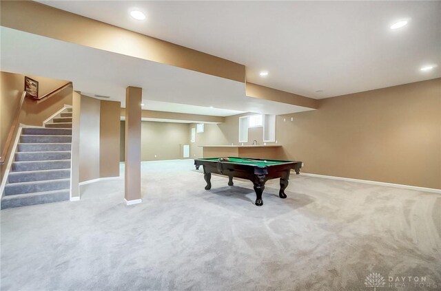 rec room with light colored carpet and billiards