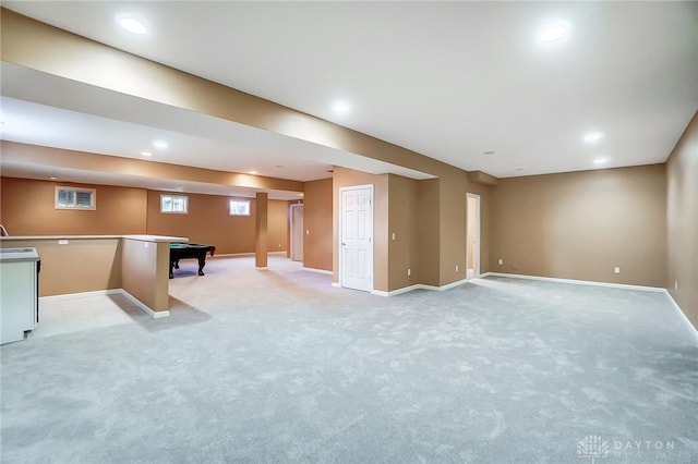 recreation room with light colored carpet and billiards