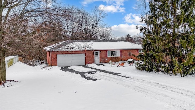 single story home with a garage