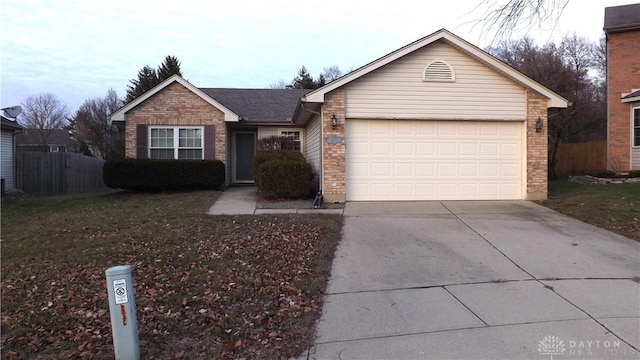 ranch-style home featuring a garage