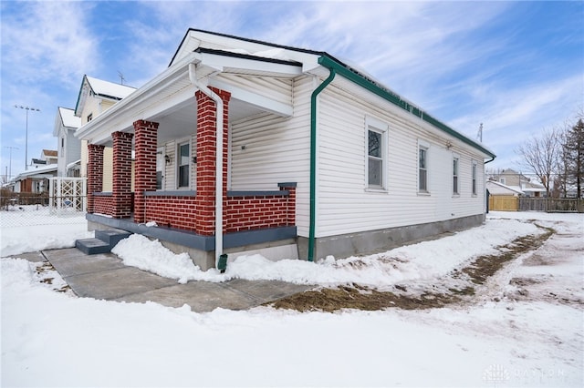 view of snow covered property