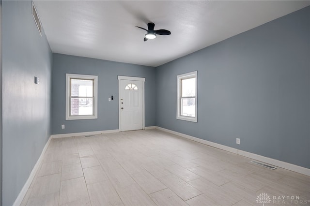 foyer featuring ceiling fan