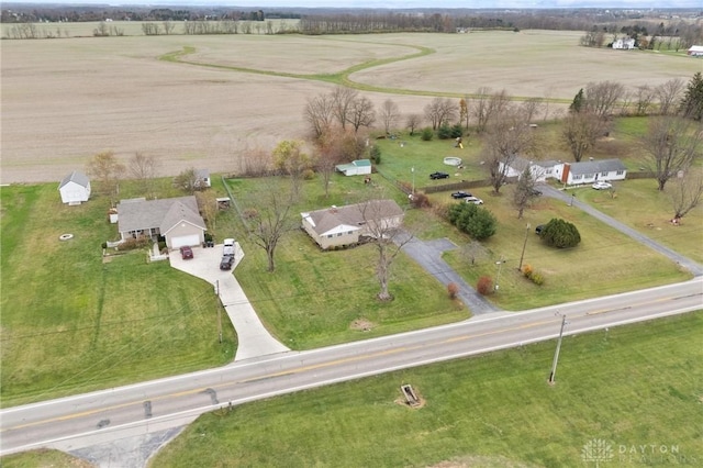 birds eye view of property featuring a rural view