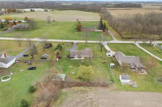 birds eye view of property featuring a rural view