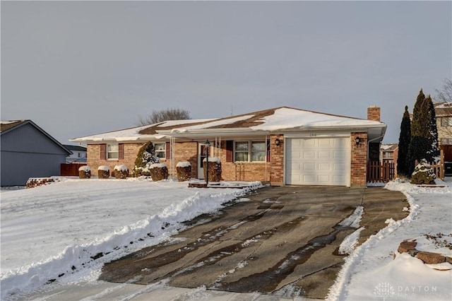 single story home with a garage