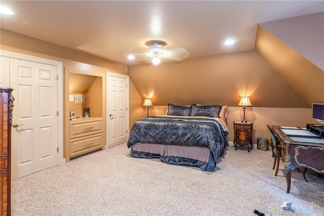 bedroom with carpet flooring, ceiling fan, and lofted ceiling