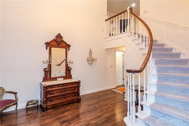 staircase featuring hardwood / wood-style floors