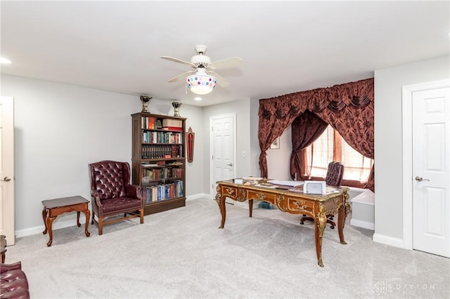 home office featuring carpet and ceiling fan