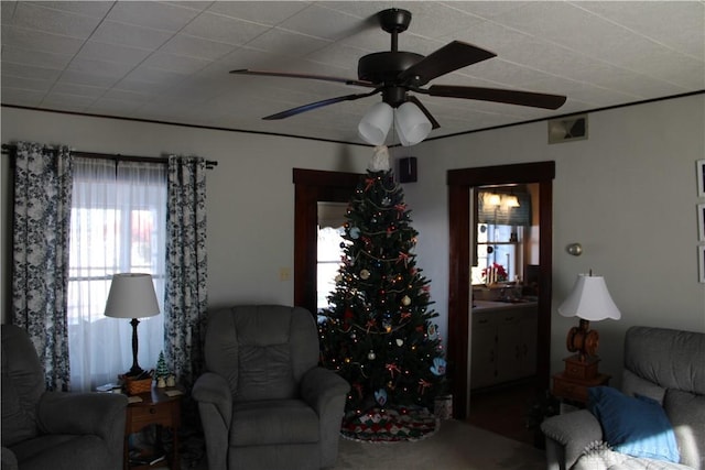 living room with ceiling fan