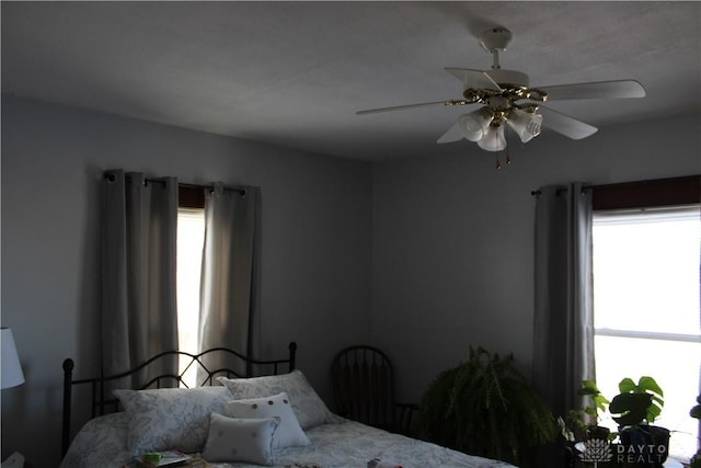 bedroom featuring ceiling fan