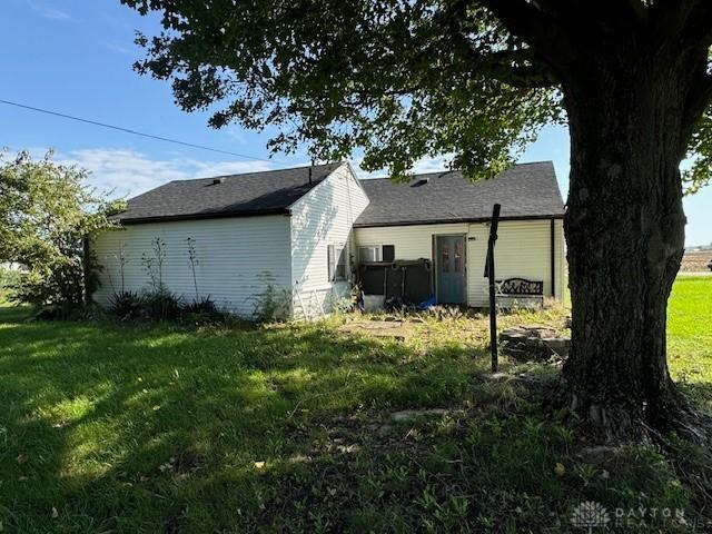 view of property exterior featuring a yard