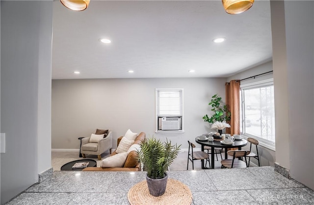 carpeted dining room with cooling unit