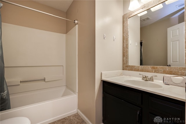 bathroom with shower / tub combination and vanity