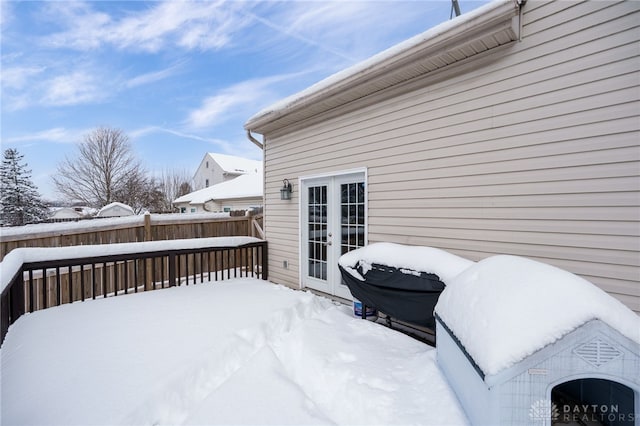 view of snow covered deck