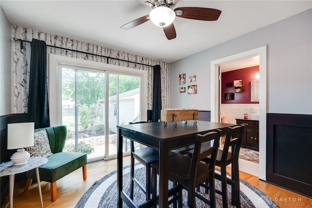 dining room featuring ceiling fan and light wood-type flooring