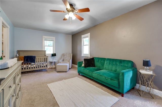 carpeted bedroom featuring ceiling fan