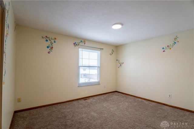 view of carpeted spare room