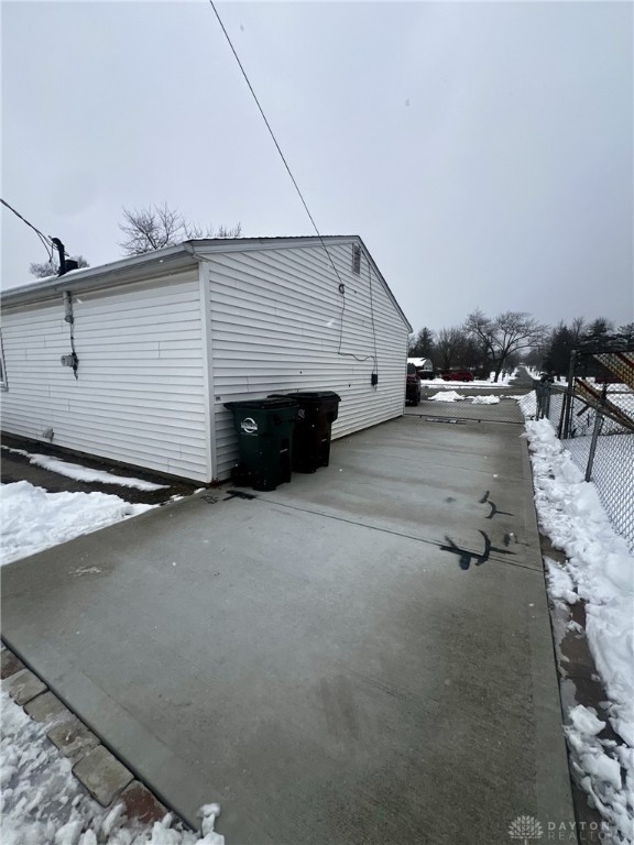 view of snow covered property