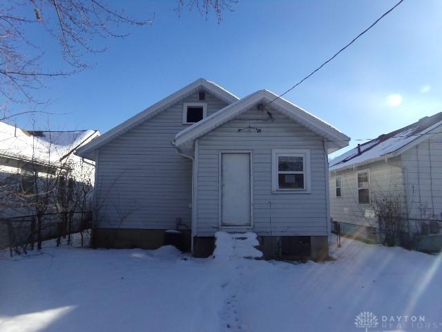 view of snow covered property