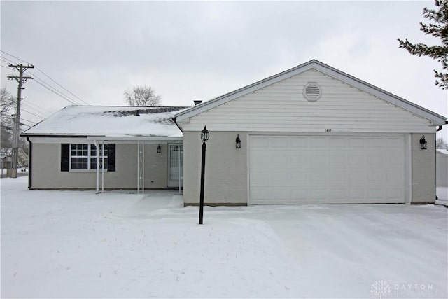 single story home featuring a garage