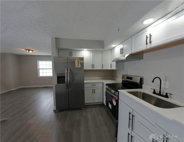 kitchen featuring white cabinetry, sink, a textured ceiling, and appliances with stainless steel finishes