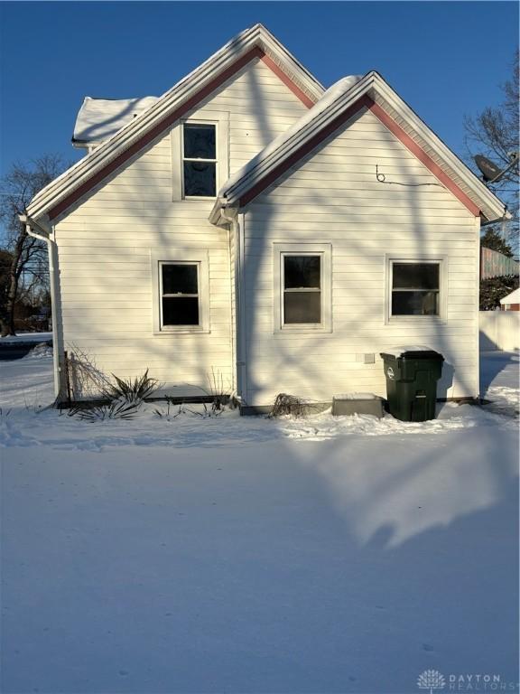 view of snow covered property