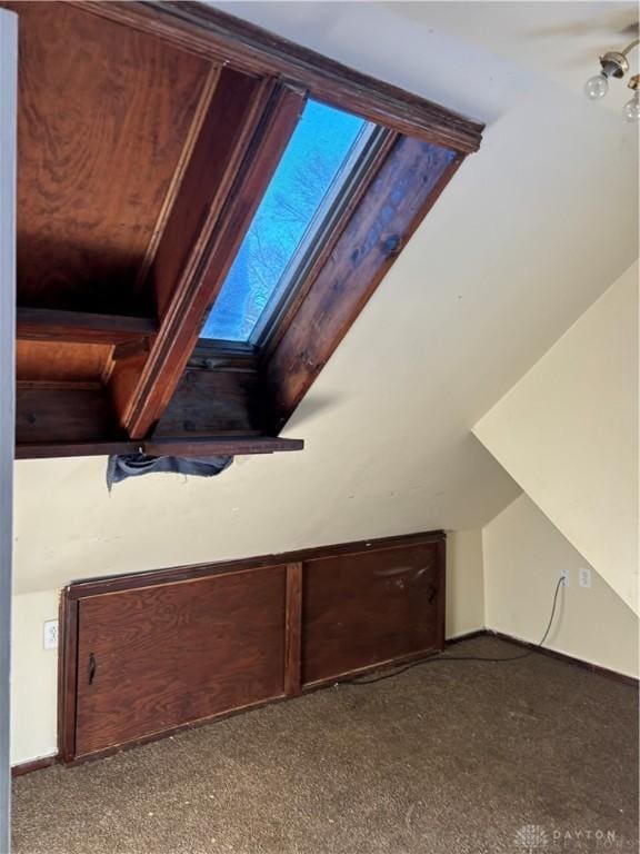 bonus room with vaulted ceiling