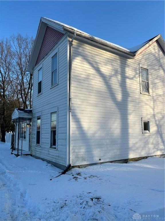 view of snow covered property