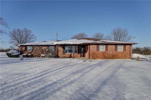 view of snow covered property