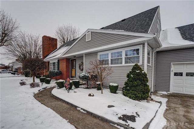 view of front of property featuring a garage