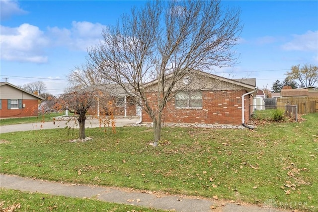 view of home's exterior featuring a yard