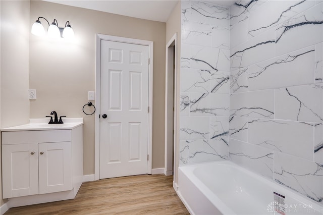 bathroom with vanity and wood-type flooring