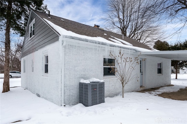 view of snow covered property